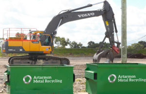 site cleaning with bins and back hoe
